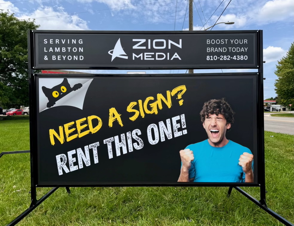 Zion Media portable billboard that says Need a Sign?